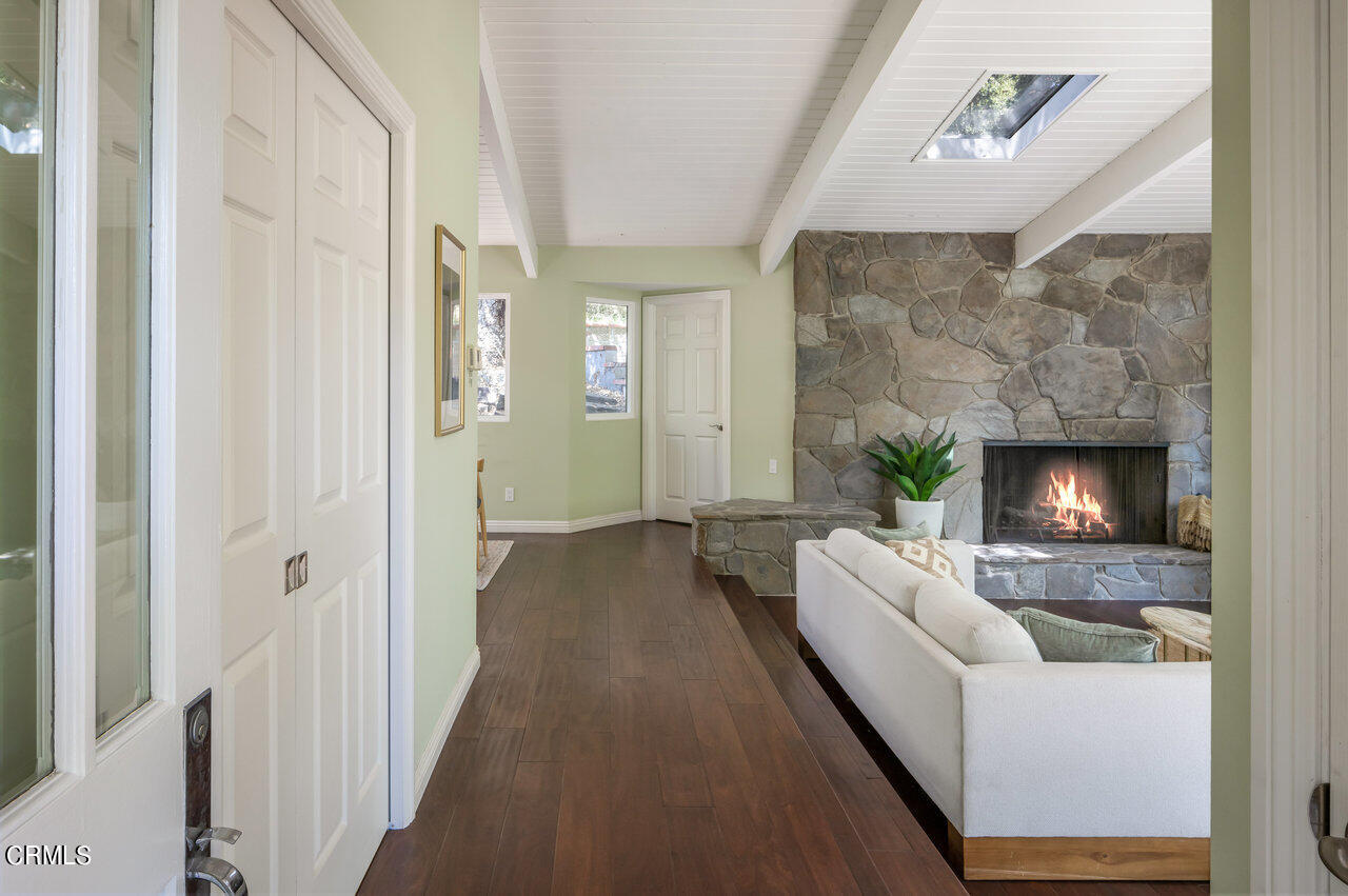 1453 Wicks Road Pasadena, CA 91103 - Photo 2 of 31 a living room with furniture and a fireplace