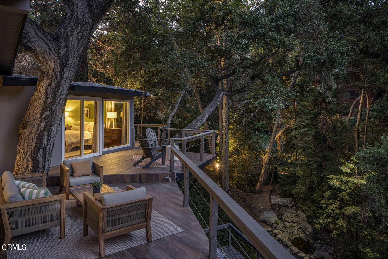 1453 Wicks Road Pasadena, CA 91103 - Photo 22 of 31 a balcony with wooden floor and furniture