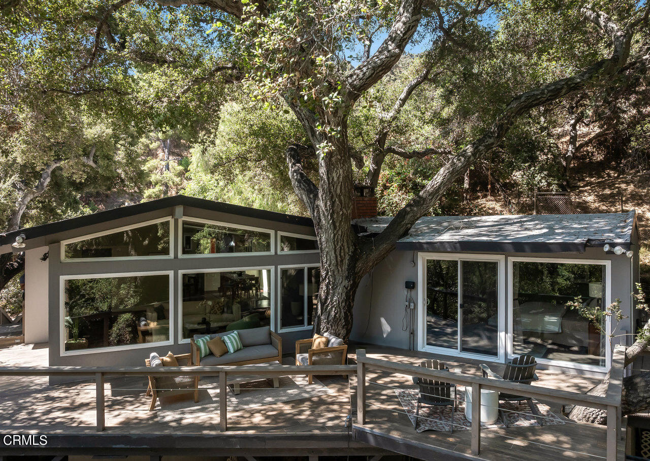 1453 Wicks Road Pasadena, CA 91103 - Photo 25 of 31 a front view of a house with sitting area and garden