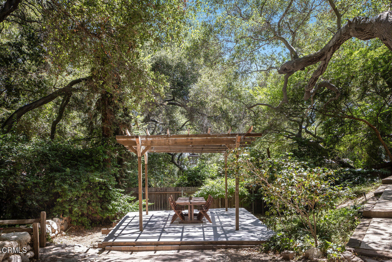 1453 Wicks Road Pasadena, CA 91103 - Photo 27 of 31 a view of a patio with table and chairs and potted plants