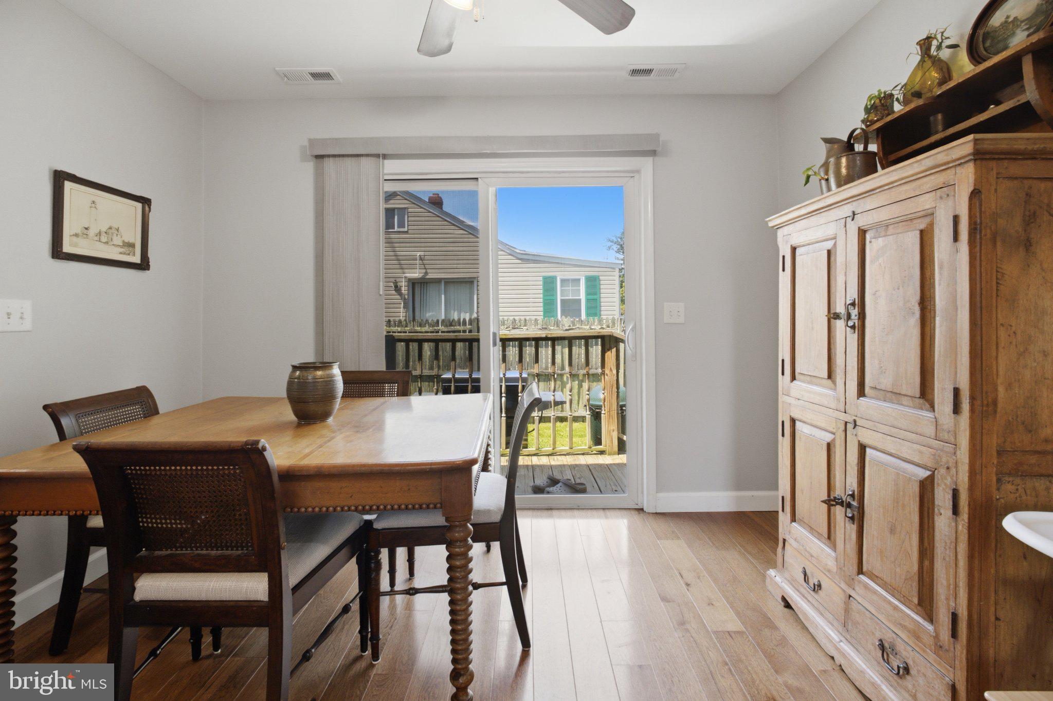 5650 Deale Churchton Road Churchton, MD 20733 - Photo 15 of 31 Bright dining space with outdoor view.