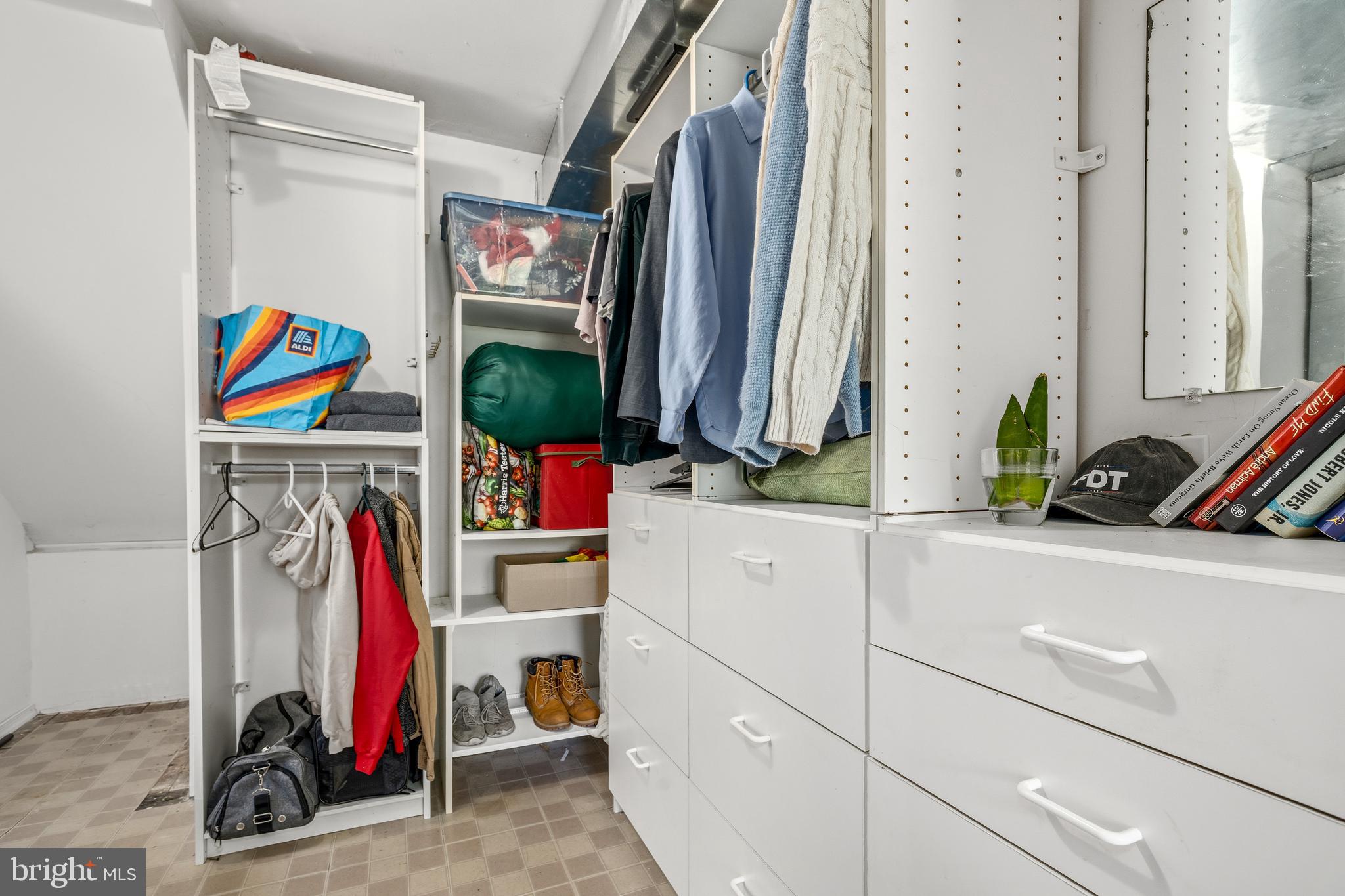 11216 Tippett Road Clinton, MD 20735 - Photo 18 of 26 a view of a closet with storage