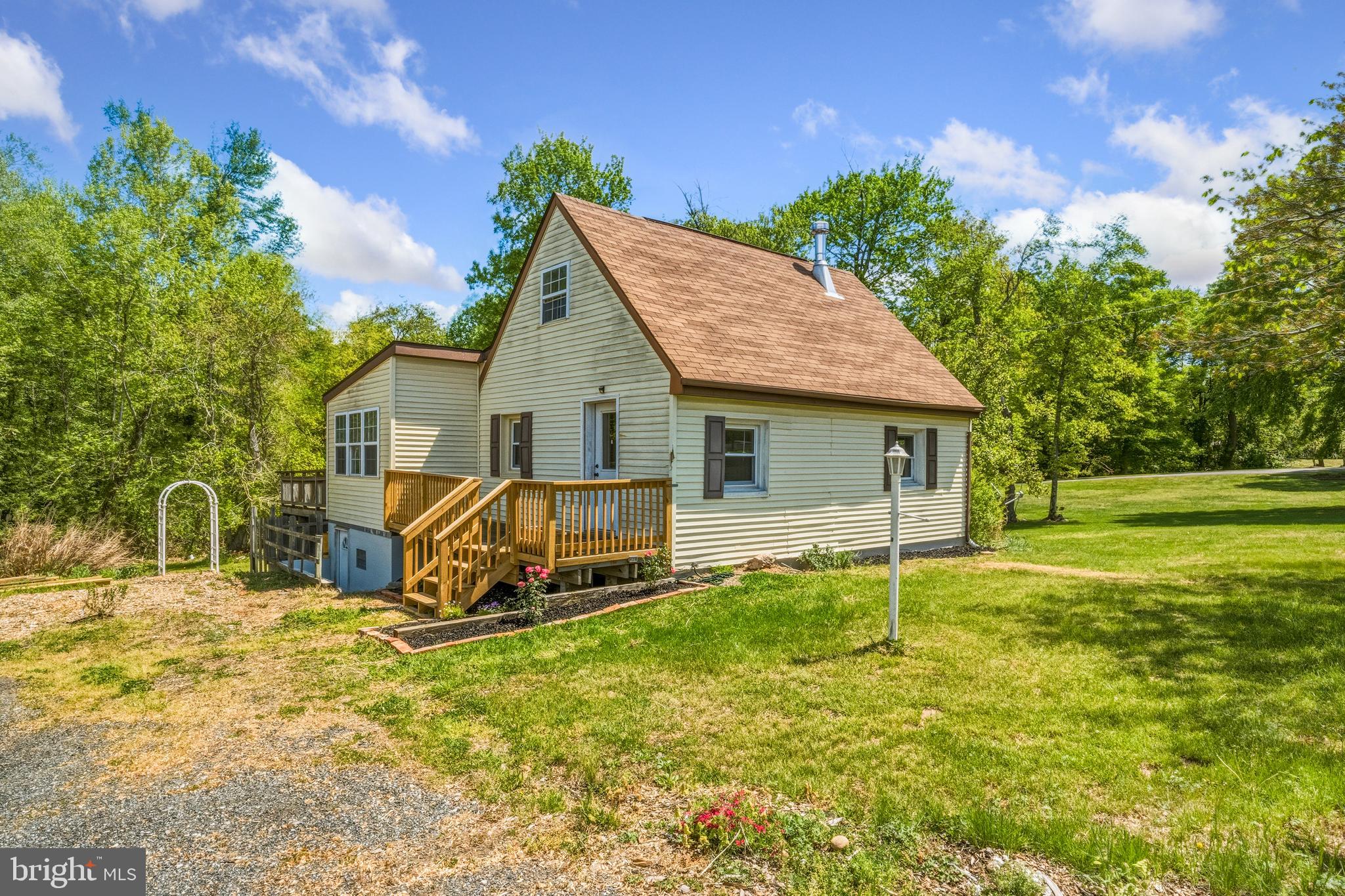 11216 Tippett Road Clinton, MD 20735 - Photo 2 of 26 a view of a house with a yard