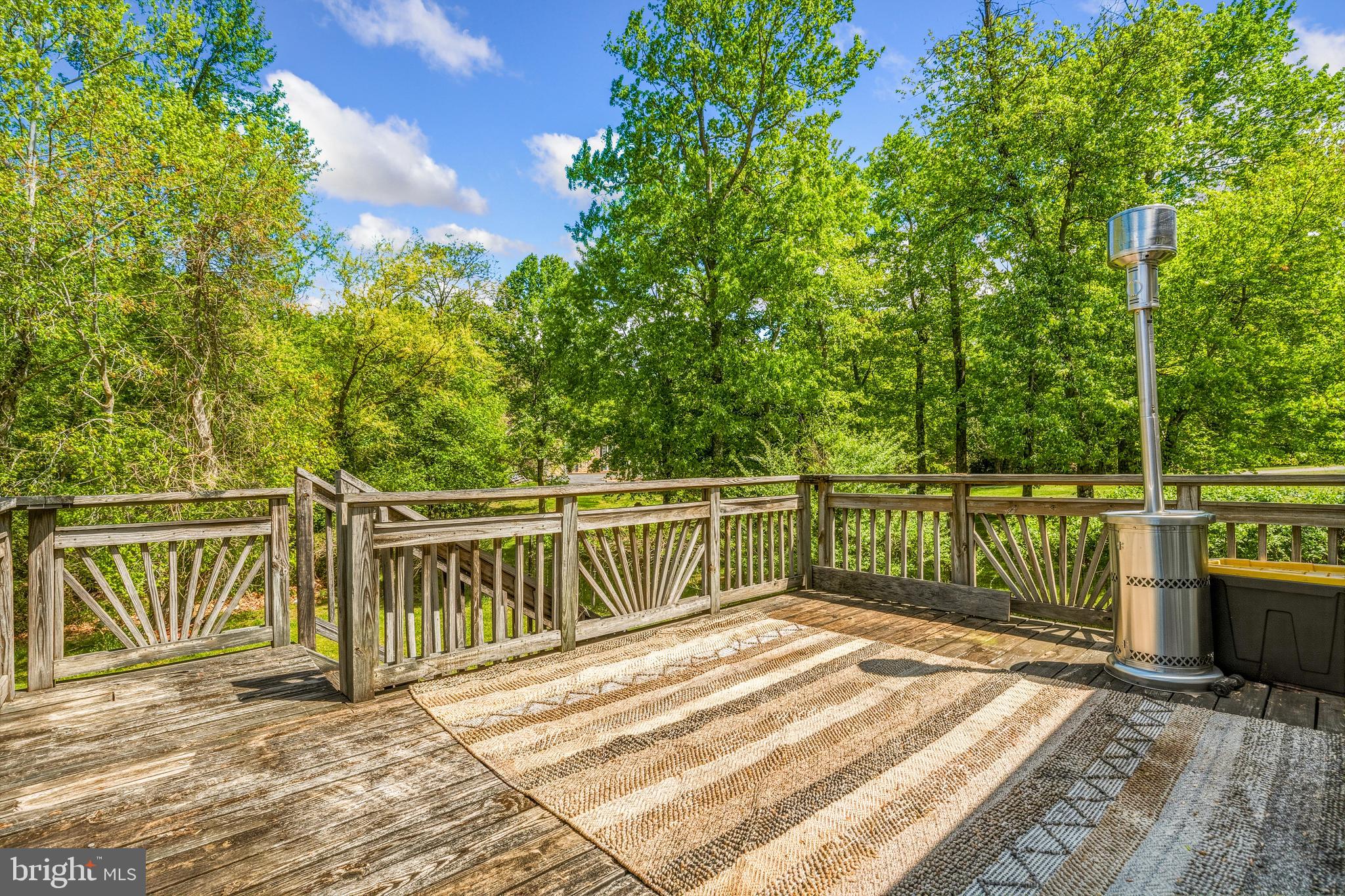 11216 Tippett Road Clinton, MD 20735 - Photo 21 of 26 a view of a balcony with wooden floor