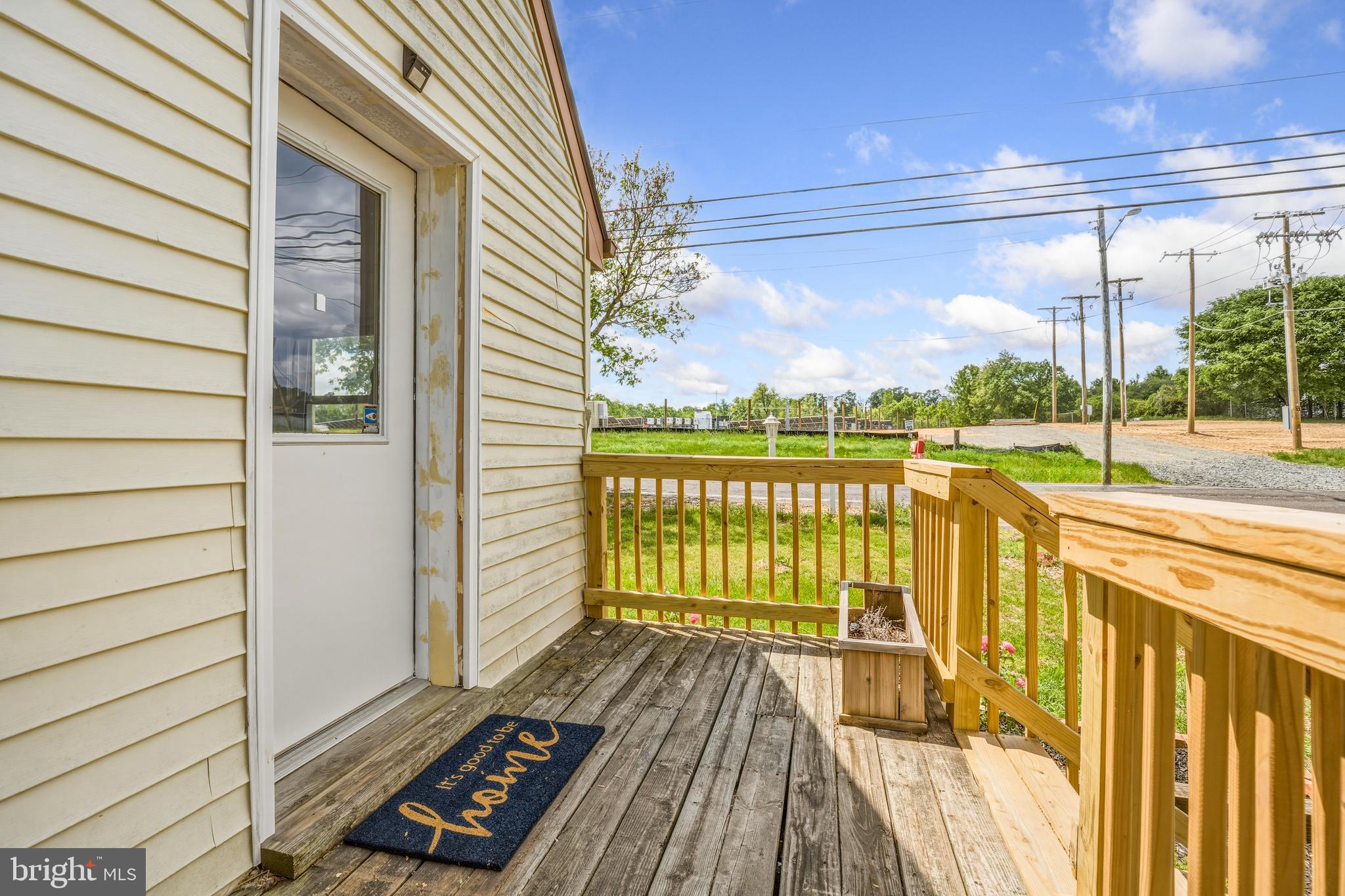 11216 Tippett Road Clinton, MD 20735 - Photo 4 of 26 a view of a balcony with wooden floor