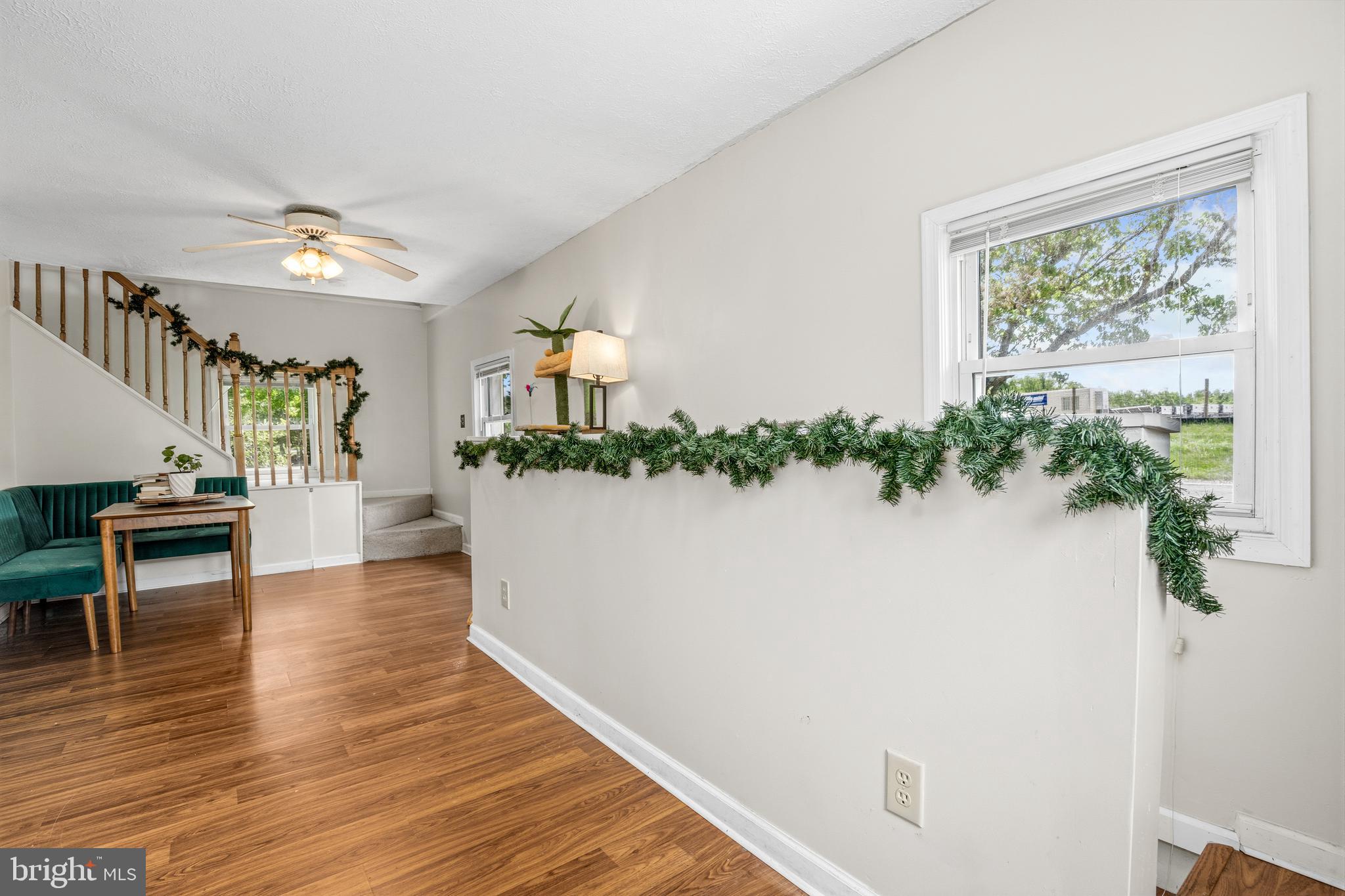 11216 Tippett Road Clinton, MD 20735 - Photo 5 of 26 a view of kitchen with furniture and wooden floor