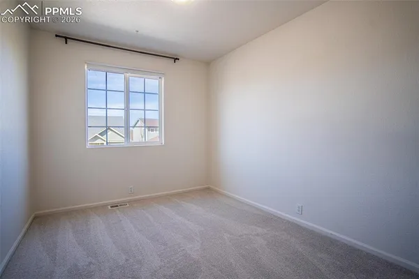 an empty room with a window