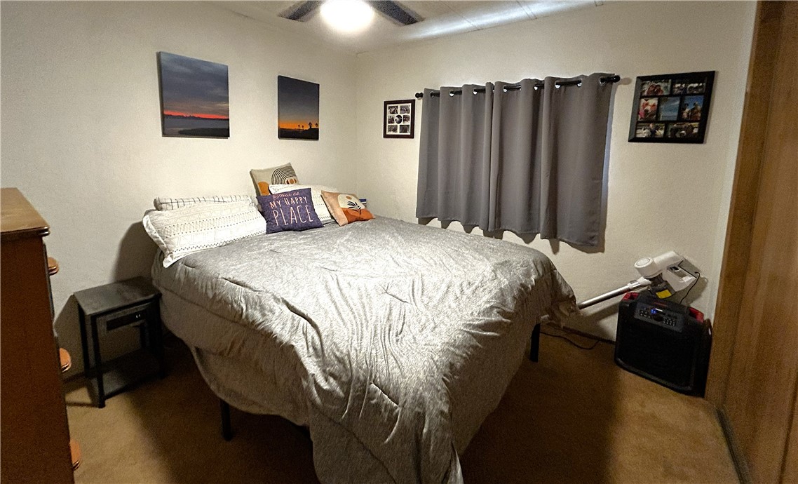 120 Thunderhead 1 Needles, CA 92363 - Photo 9 of 10 a bedroom with bed and wooden floor