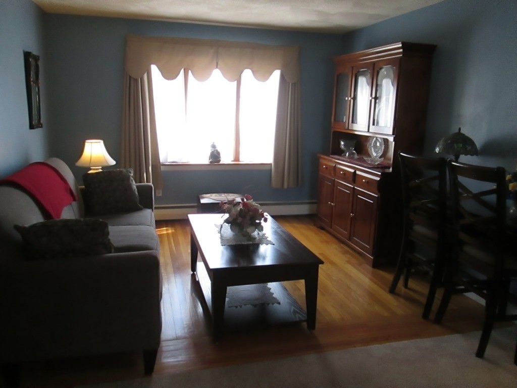 41 Millbrook Road Beverly, MA 01915 - Photo 7 of 20 a living room with furniture rug and window