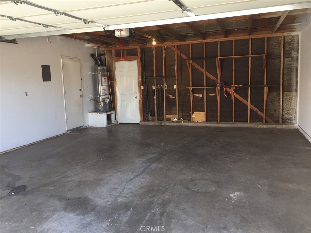 20955 Little Beaver Road, Unit 2 Apple Valley, CA 92308 - Photo 8 of 8 a view of a car garage