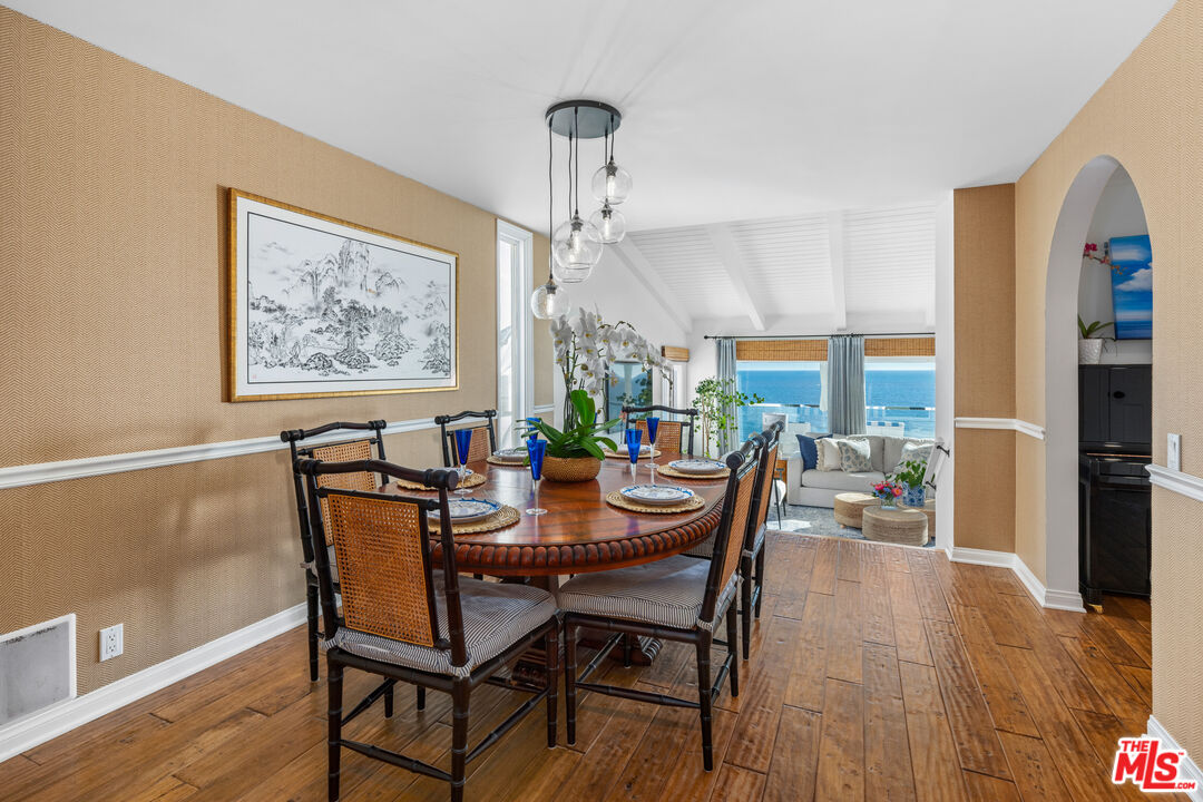 31658 Broad Beach Road Malibu, CA 90265 - Photo 12 of 50 a view of a dining room with furniture window and wooden floor