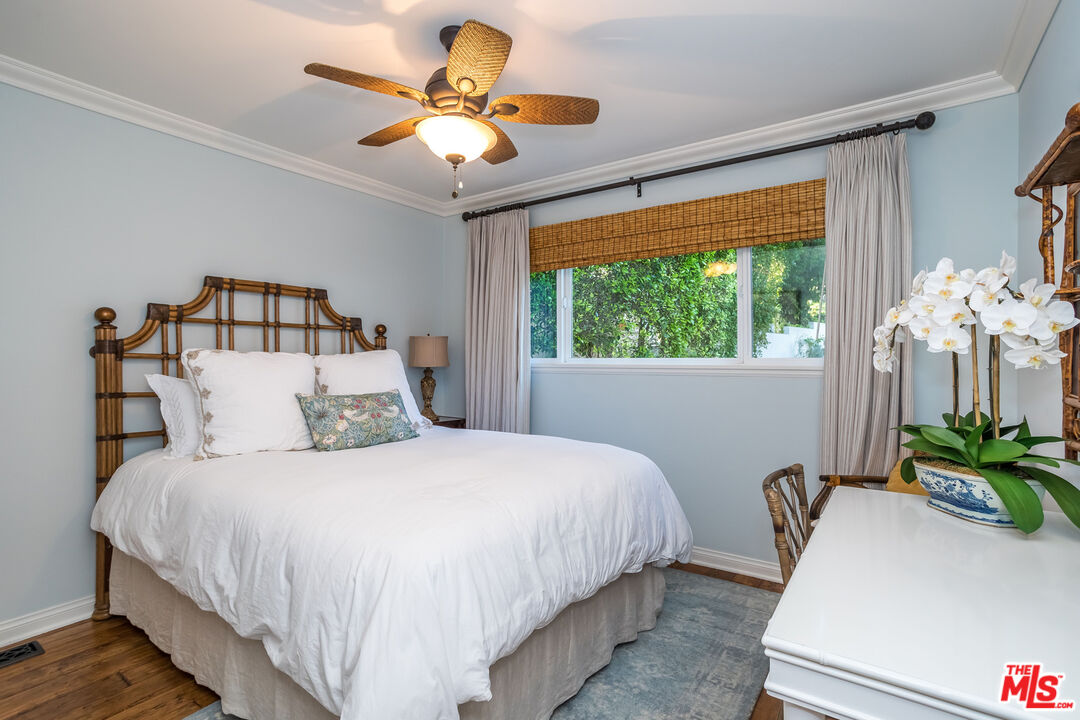 31658 Broad Beach Road Malibu, CA 90265 - Photo 26 of 50 a bedroom with a bed and a large window