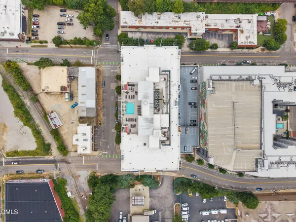a aerial view of a building with outdoor space