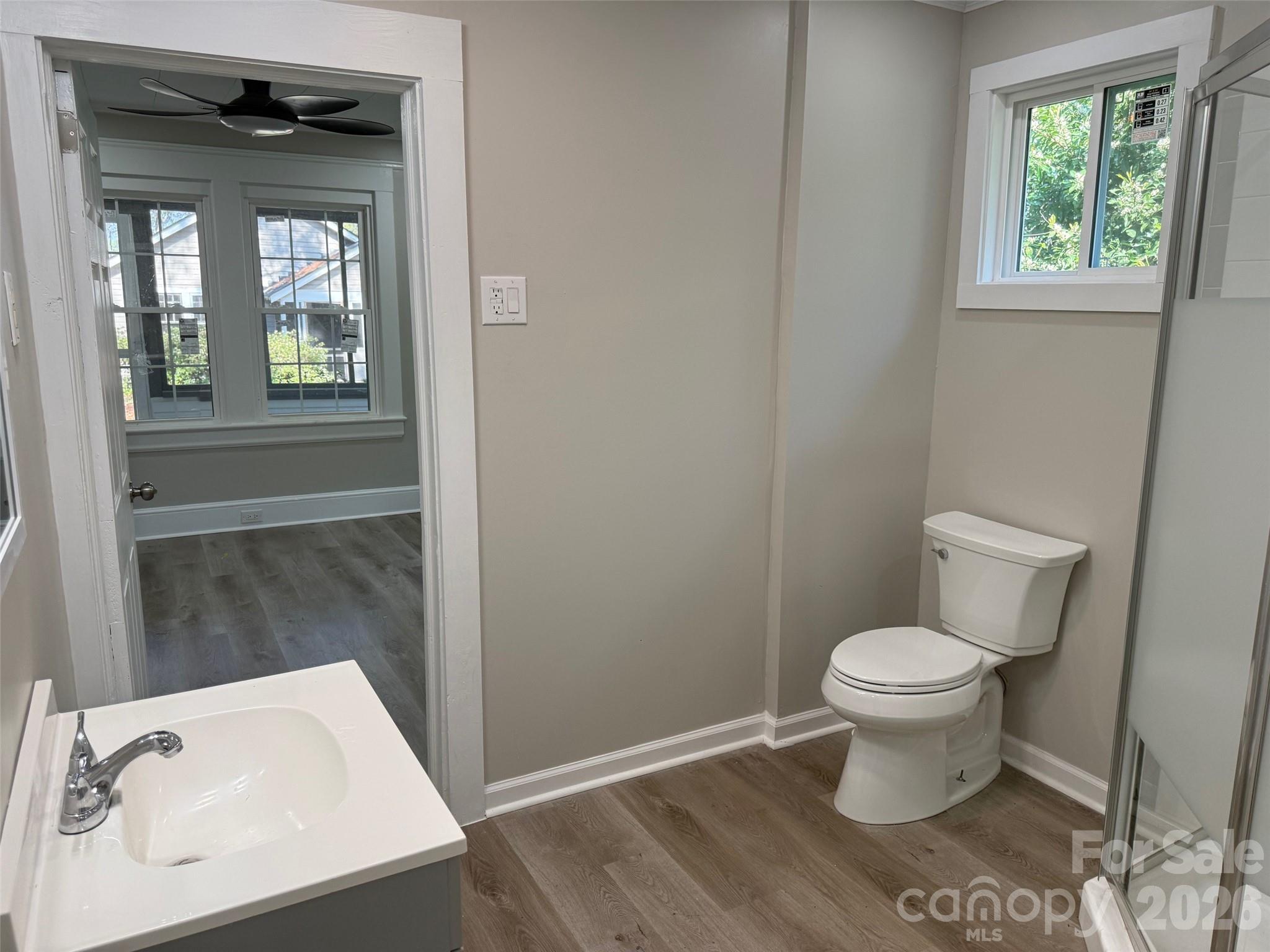 161 Seaboard Street Cheraw, SC 29520 - Photo 12 of 15 a bathroom with a toilet and a sink
