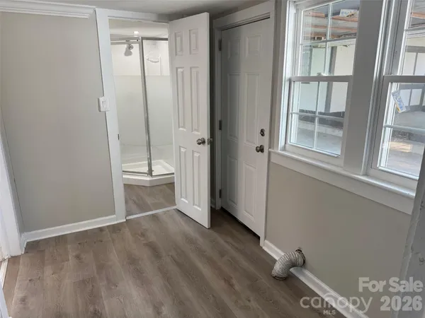 an empty room with windows
