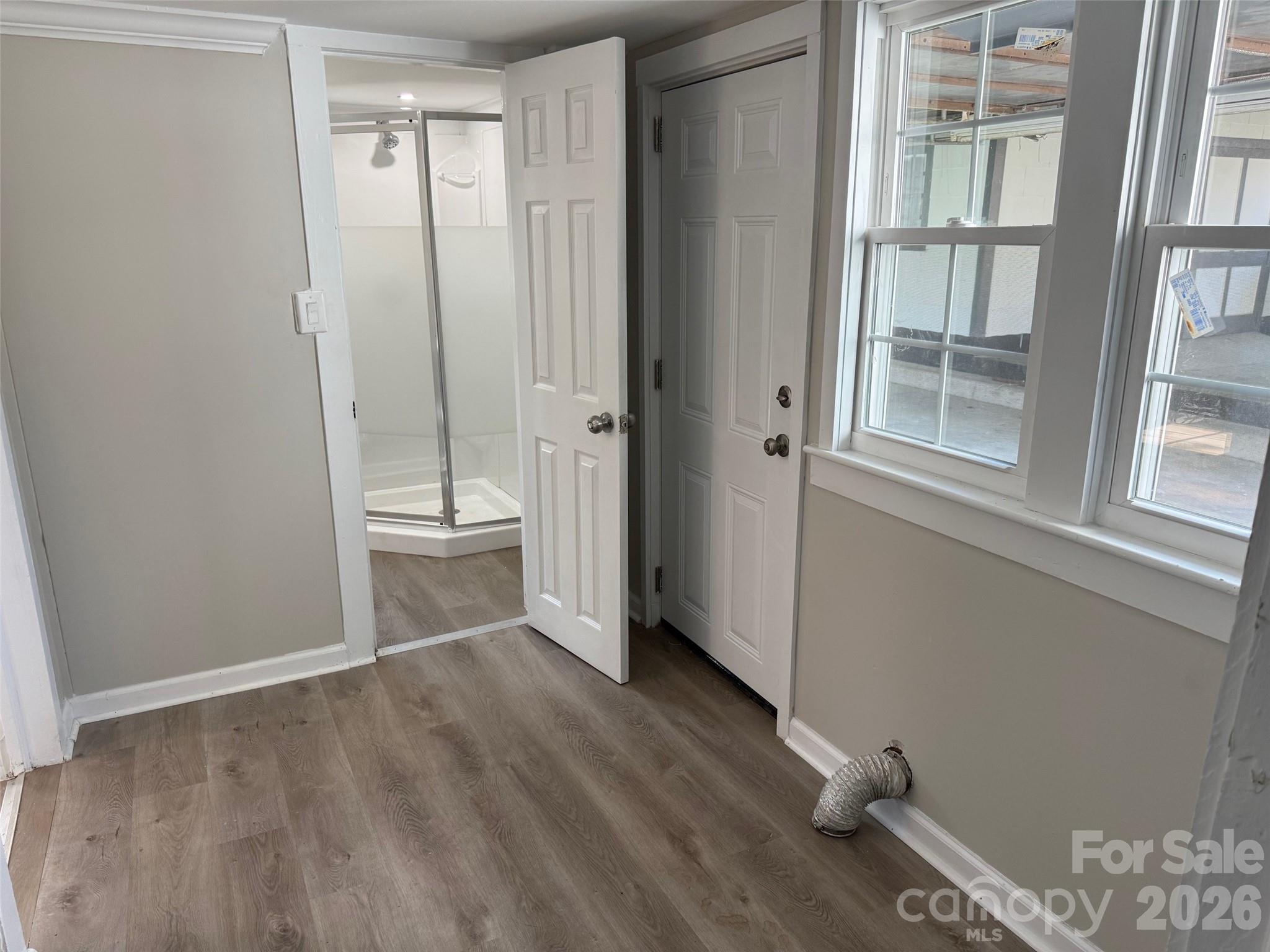 161 Seaboard Street Cheraw, SC 29520 - Photo 15 of 15 an empty room with windows