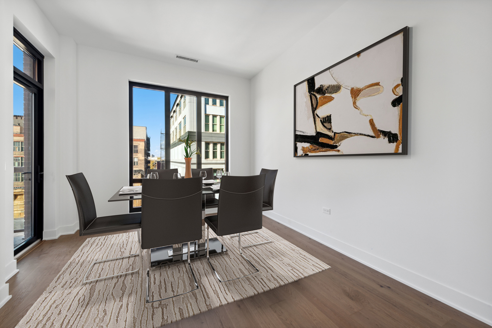 323 South Racine Avenue, Unit 6B Chicago, IL 60607 - Photo 5 of 25 a view of a dining room with furniture window and wooden floor