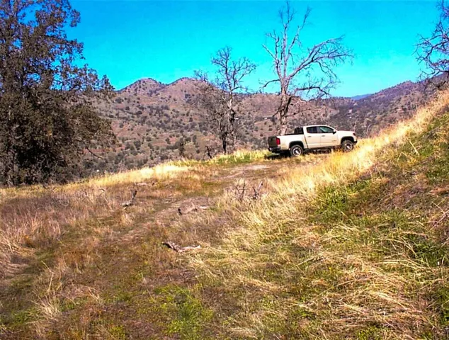 a view of a house with a mountain