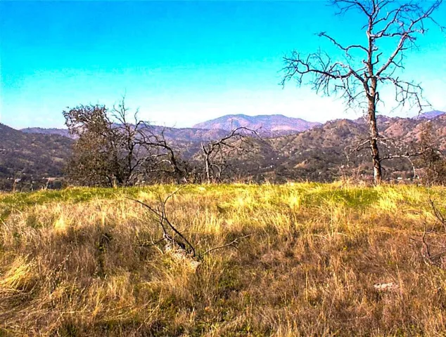 a view of lake and mountains