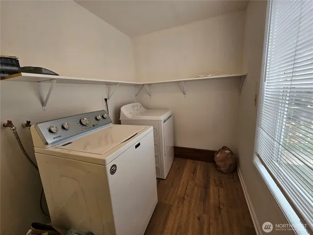a utility room with dryer and washer