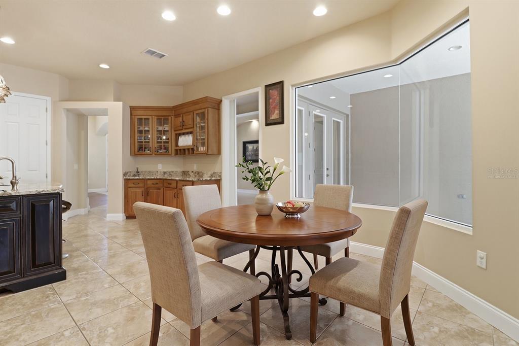 2125 Southeast 25th Loop Ocala, FL 34471 - Photo 18 of 60 a view of a dining room with furniture