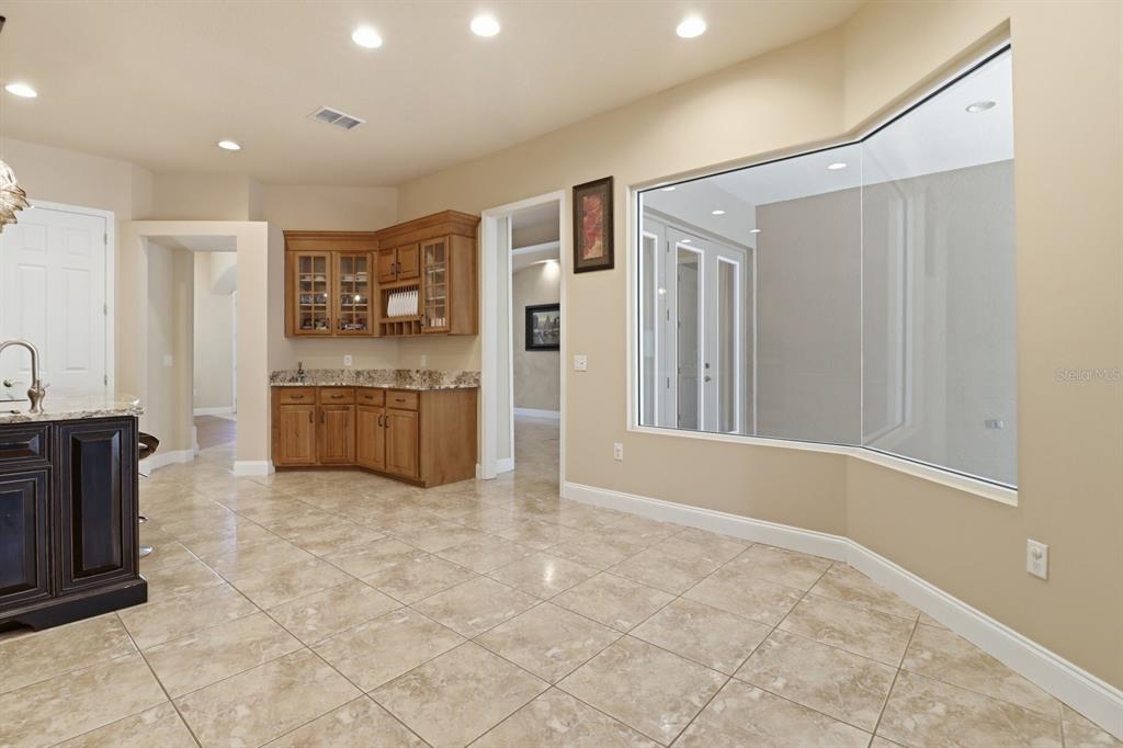 2125 Southeast 25th Loop Ocala, FL 34471 - Photo 19 of 60 a view of kitchen with stainless steel appliances granite countertop a refrigerator and a sink