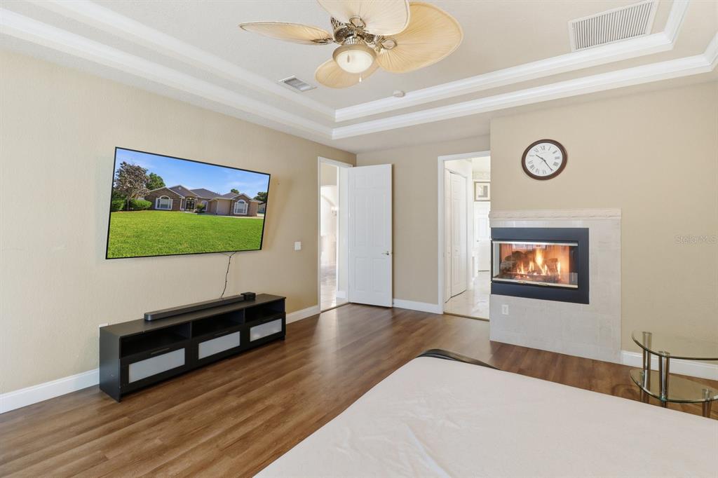 2125 Southeast 25th Loop Ocala, FL 34471 - Photo 28 of 60 a living room with furniture and a flat screen tv
