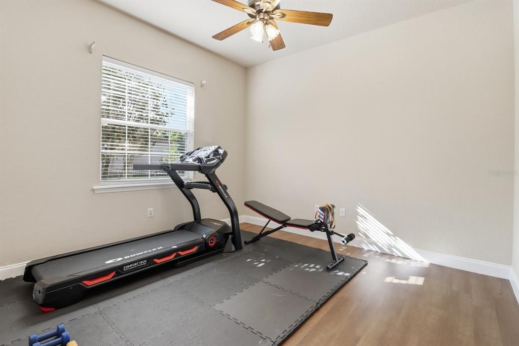 2125 Southeast 25th Loop Ocala, FL 34471 - Photo 39 of 60 a room with gym equipment