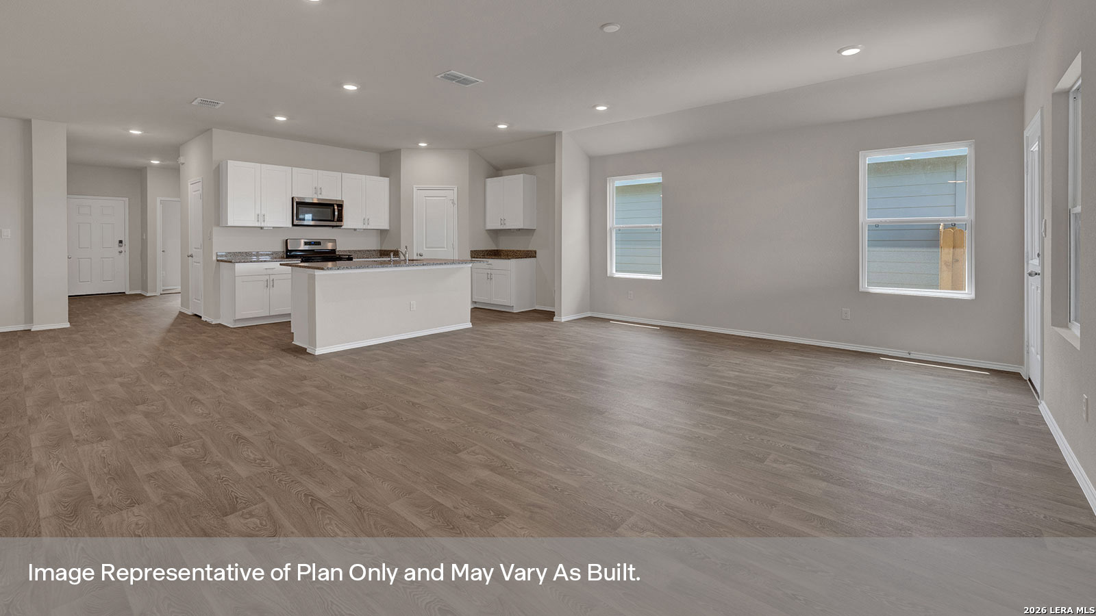 227 Hodges Street Maxwell, TX 78656 - Photo 21 of 38 a view of kitchen with kitchen island stainless steel appliances sink refrigerator and microwave