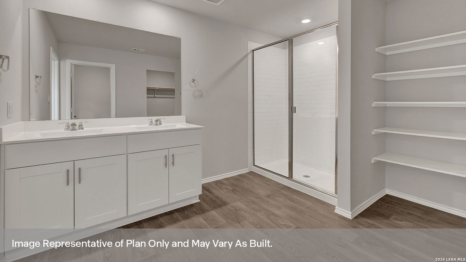 227 Hodges Street Maxwell, TX 78656 - Photo 25 of 38 a bathroom with a double vanity sink and mirror