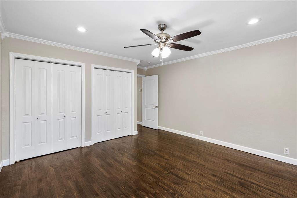 653 Kessler Boulevard Sherman, TX 75092 - Photo 12 of 30 a view of an empty room with wooden floor