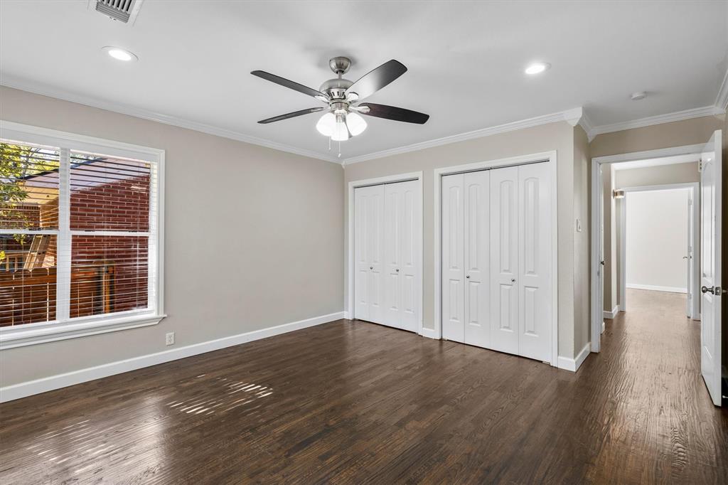 653 Kessler Boulevard Sherman, TX 75092 - Photo 16 of 30 a view of an empty room with wooden floor and a window