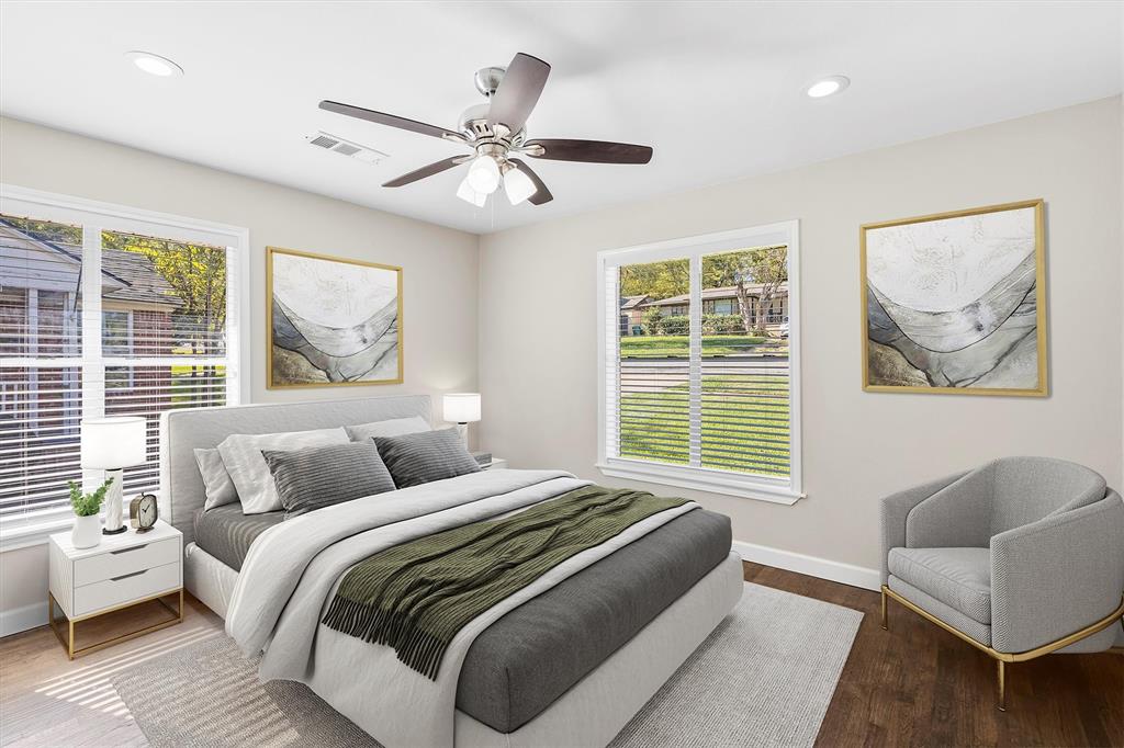 653 Kessler Boulevard Sherman, TX 75092 - Photo 18 of 30 a bedroom with a large bed and a window