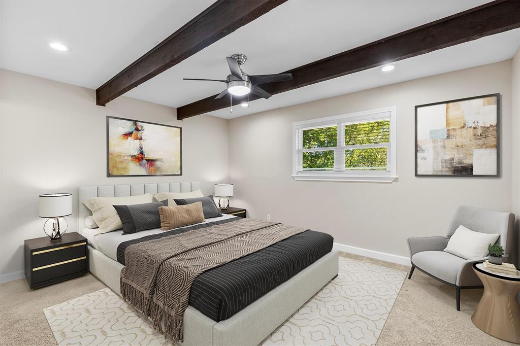 653 Kessler Boulevard Sherman, TX 75092 - Photo 26 of 30 a bedroom with a bed and a couch