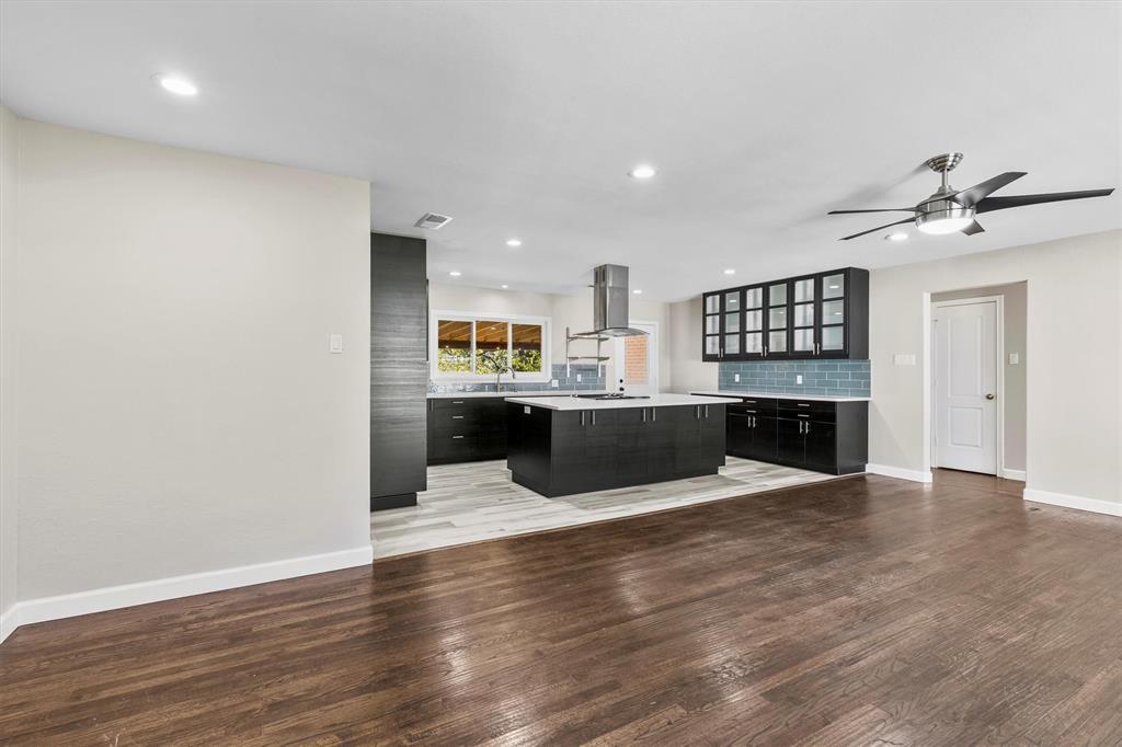 653 Kessler Boulevard Sherman, TX 75092 - Photo 28 of 30 a view of kitchen with wooden floor