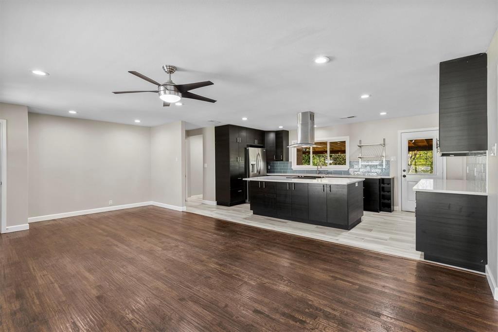653 Kessler Boulevard Sherman, TX 75092 - Photo 6 of 30 a view of kitchen with cabinets microwave and refrigerator