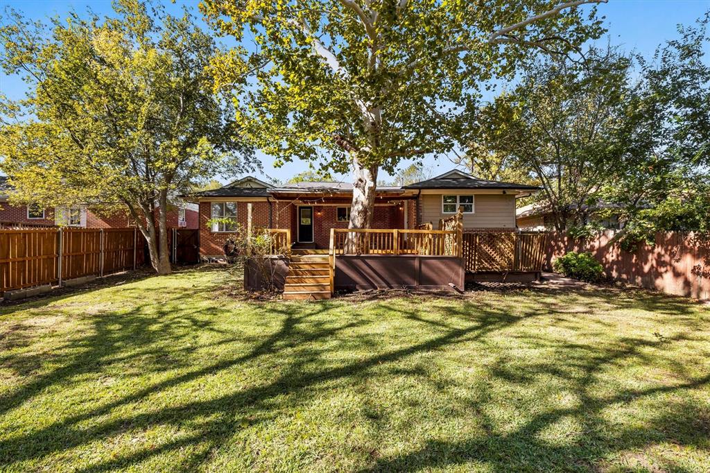 653 Kessler Boulevard Sherman, TX 75092 - Photo 7 of 30 a view of a house with backyard porch and sitting area