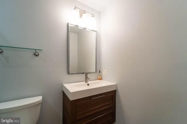 a bathroom with a shower and a toilet