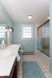 a room with a table and chairs