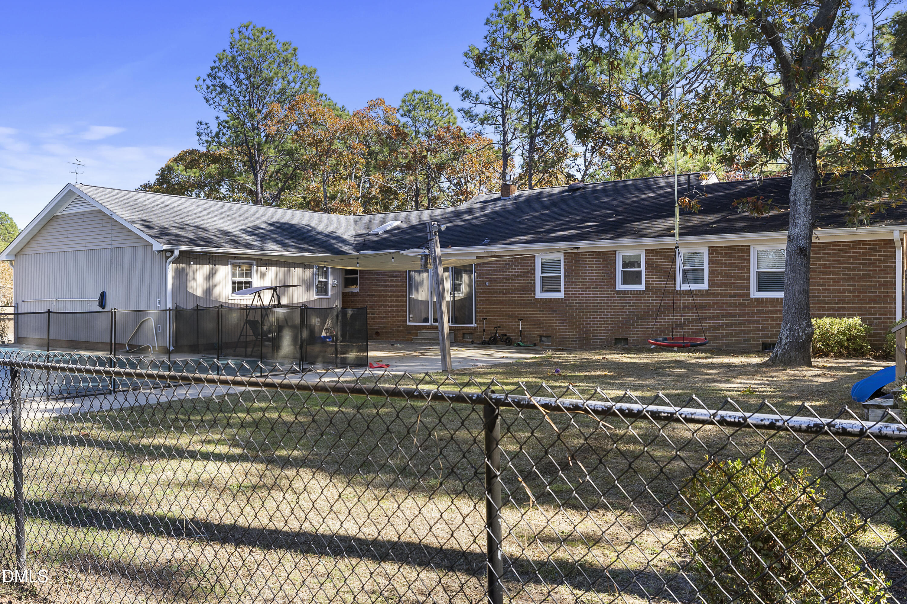2636 Nicholson Road Cameron, NC 28326 - Photo 14 of 68 a view of a house with a swimming pool