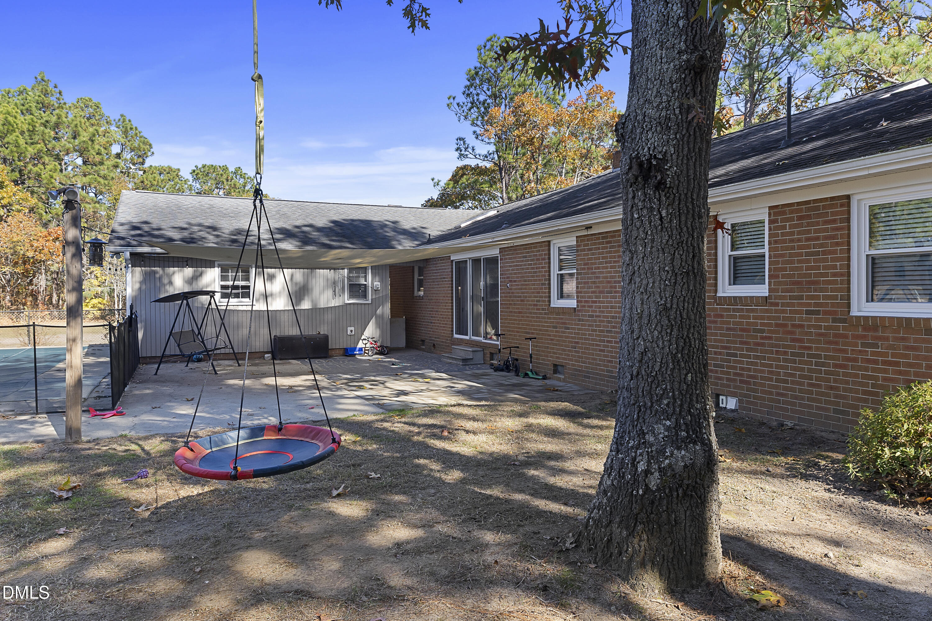 2636 Nicholson Road Cameron, NC 28326 - Photo 16 of 68 a view of a backyard with a tree