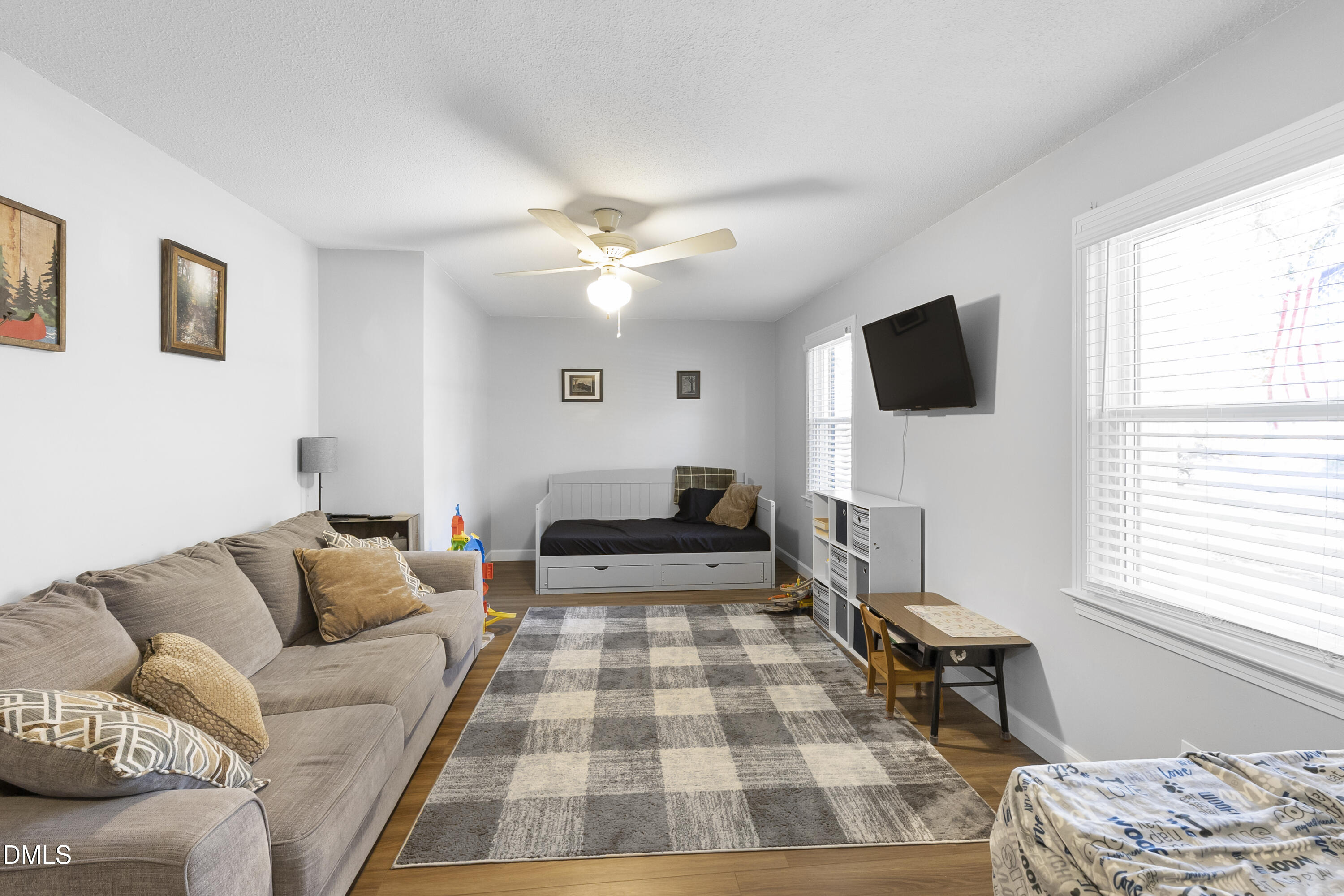 2636 Nicholson Road Cameron, NC 28326 - Photo 28 of 68 a living room with furniture and a flat screen tv