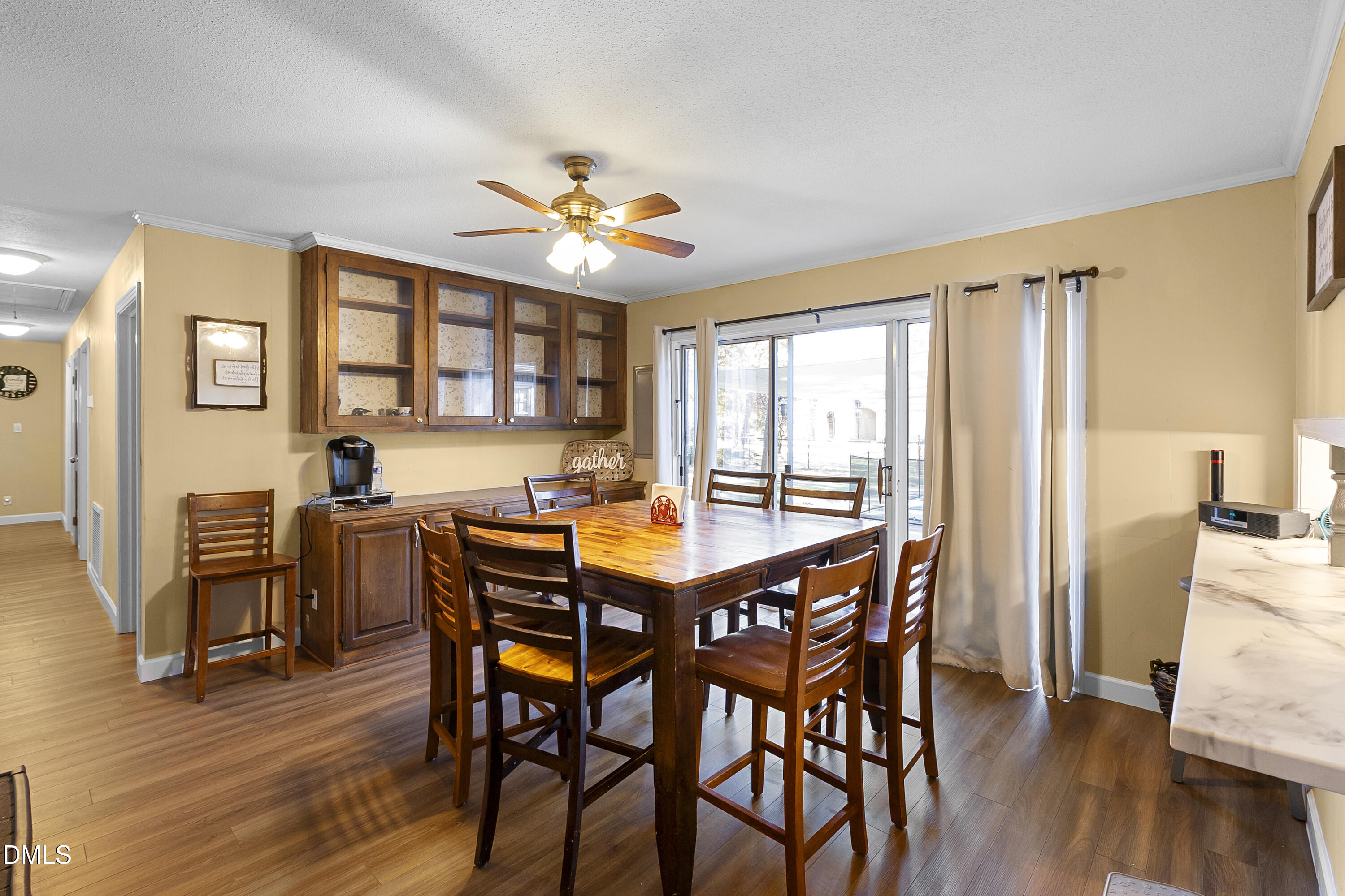 2636 Nicholson Road Cameron, NC 28326 - Photo 31 of 68 a view of a dining room with furniture window and wooden floor