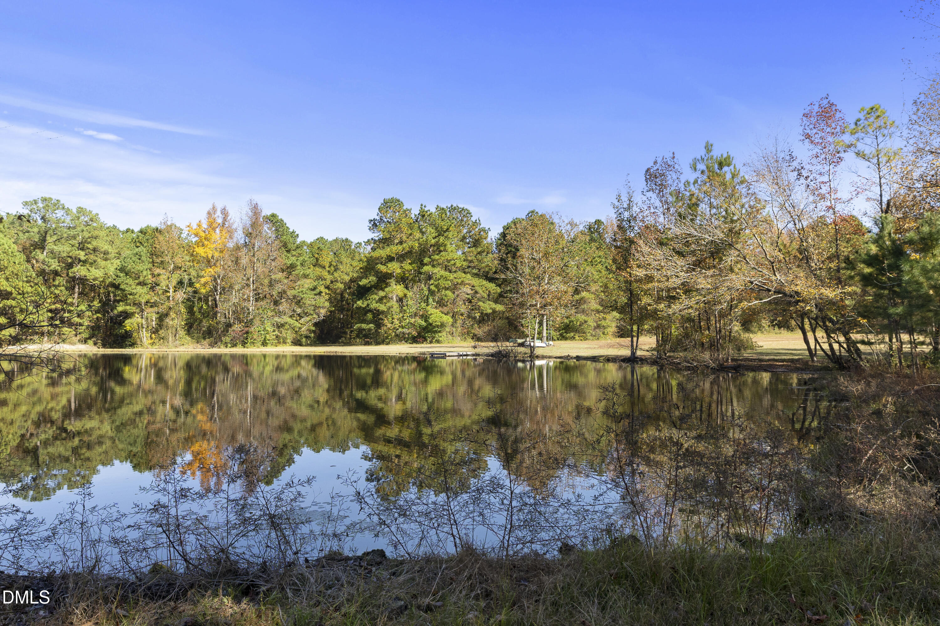 2636 Nicholson Road Cameron, NC 28326 - Photo 52 of 68 a view of a lake with a mountain