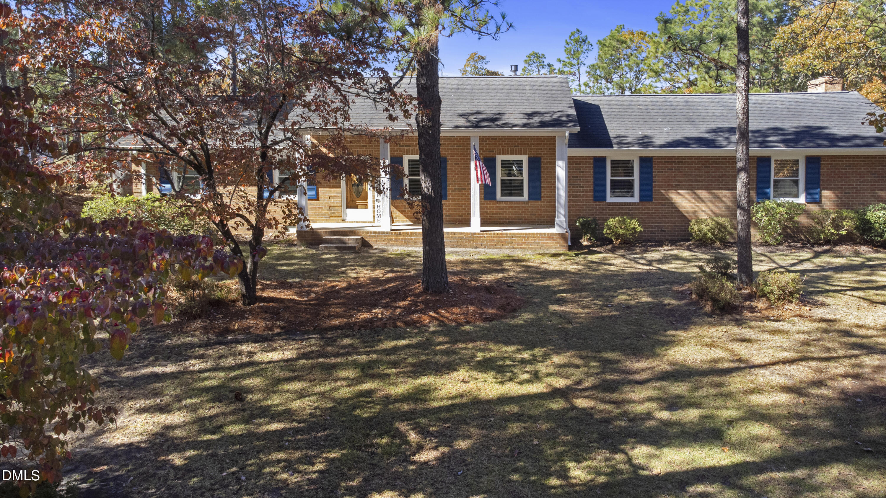 2636 Nicholson Road Cameron, NC 28326 - Photo 55 of 68 a view of a house with large tree and wooden fence