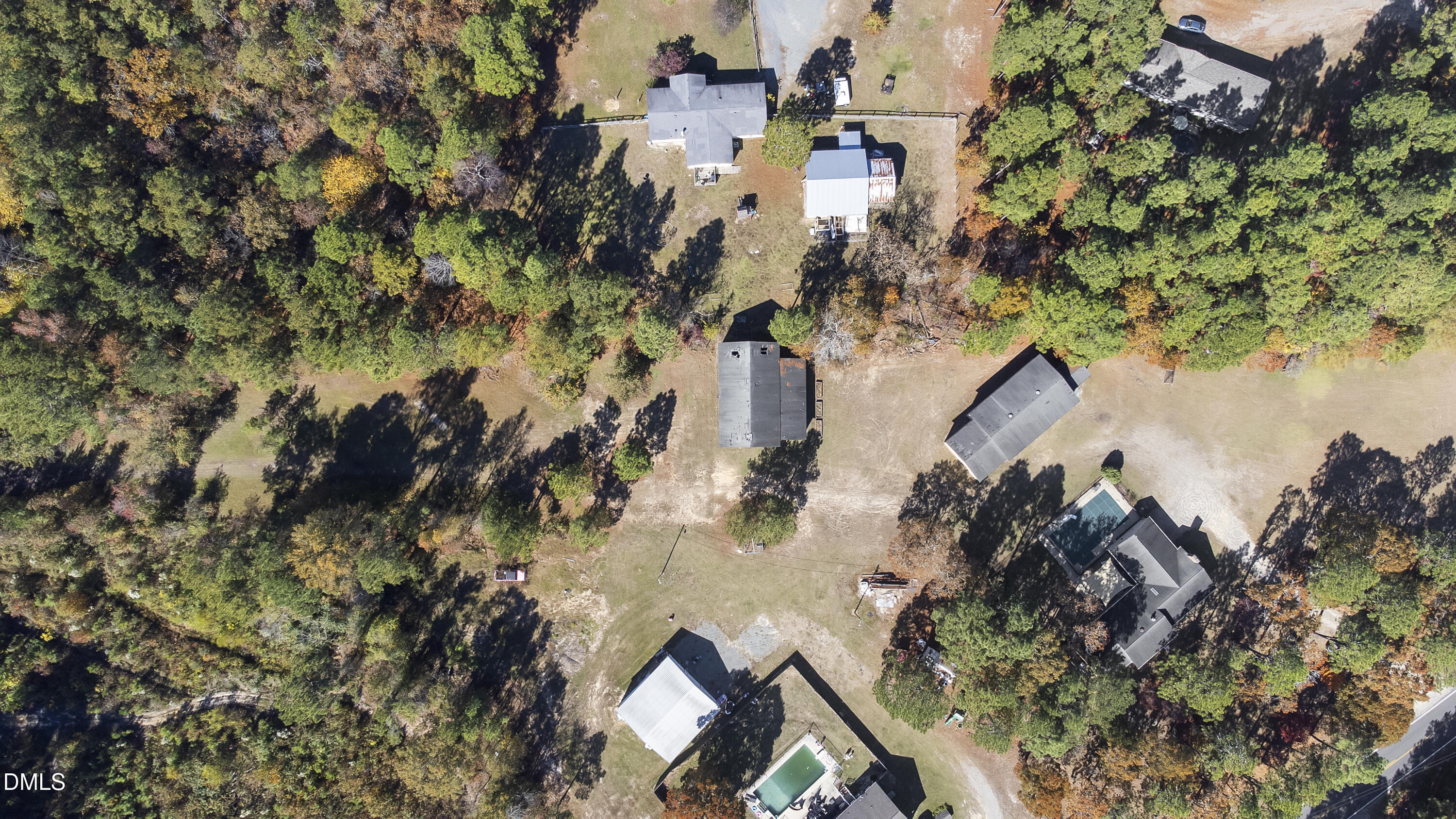 2636 Nicholson Road Cameron, NC 28326 - Photo 57 of 68 an aerial view of a house with a yard and lake view
