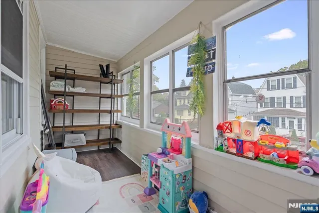 a bathroom with a sink mirror vanity and toilet