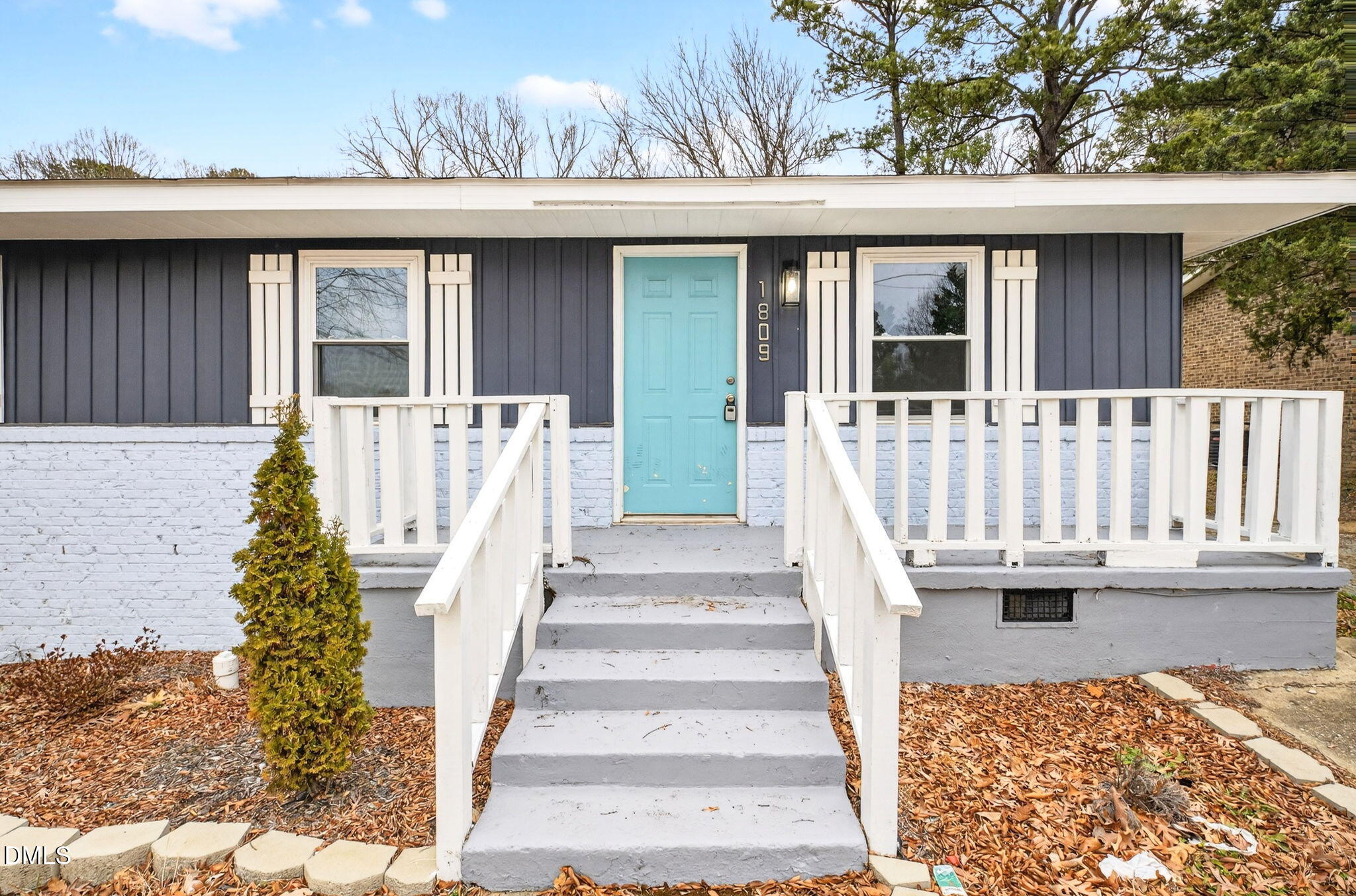 1809 Martin Luther King Jr Boulevard Raleigh, NC 27610 - Photo 1 of 26 a view of a patio with table and chairs