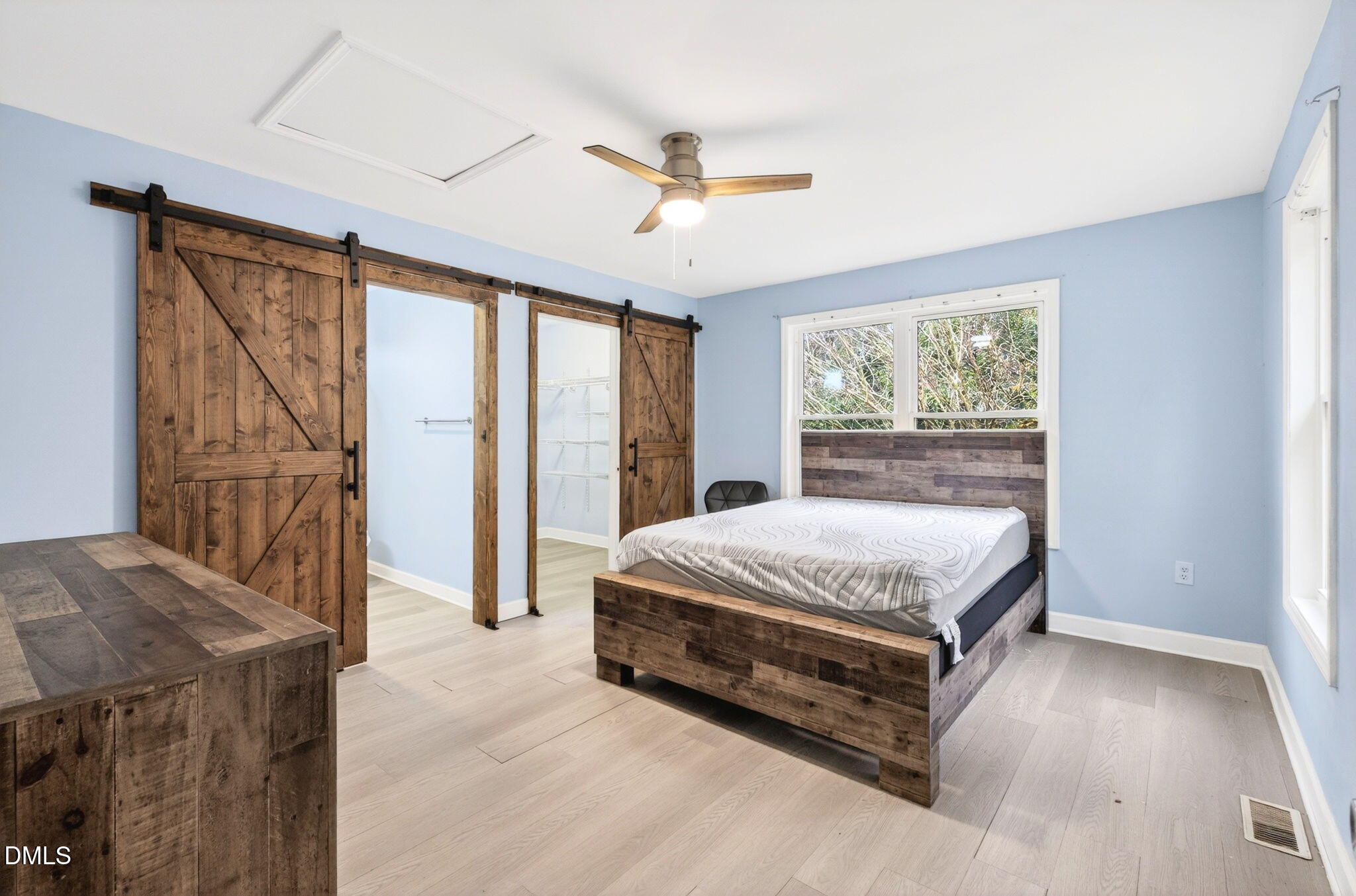 1809 Martin Luther King Jr Boulevard Raleigh, NC 27610 - Photo 12 of 26 a bedroom with a bed and a window