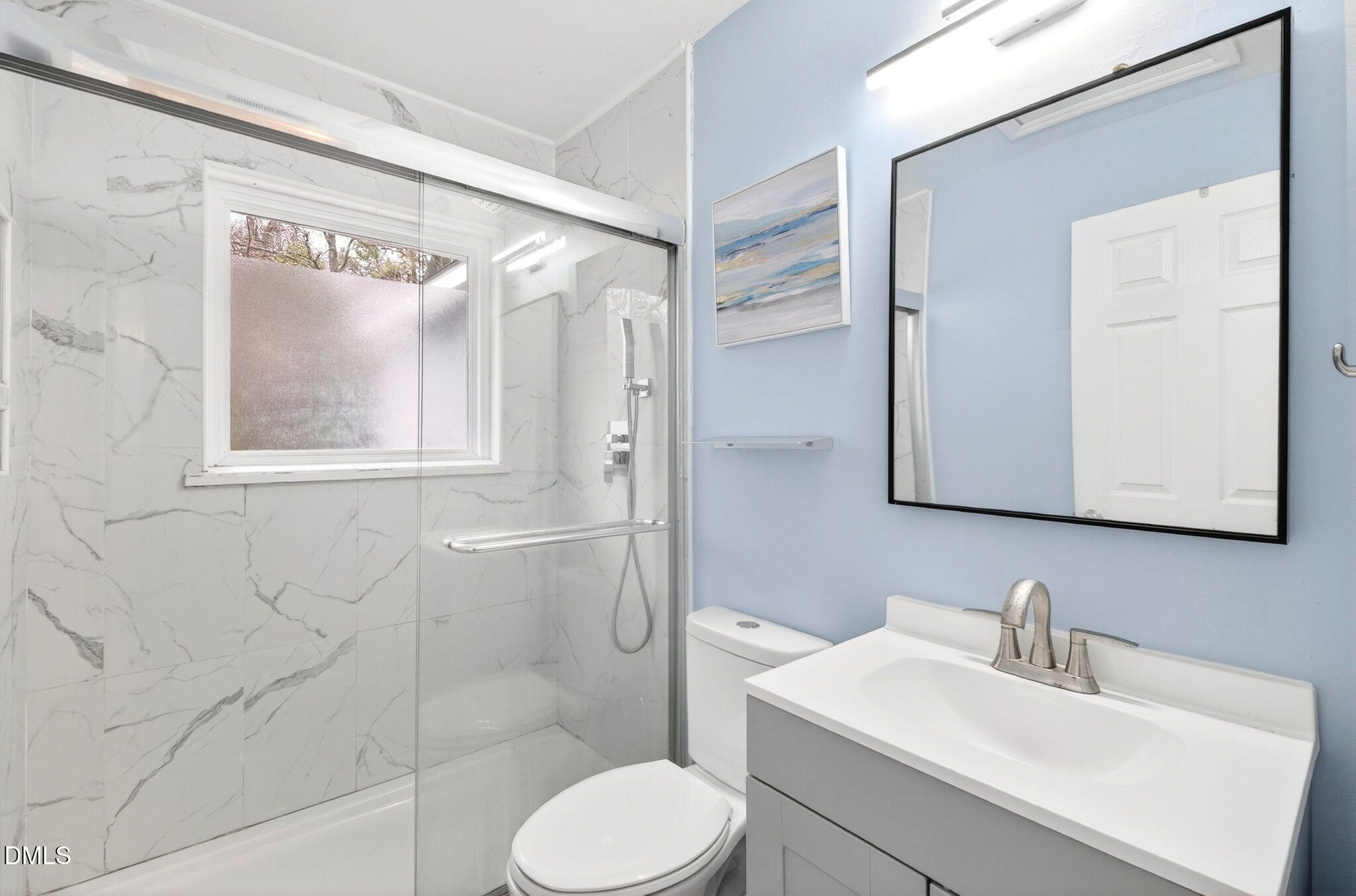 1809 Martin Luther King Jr Boulevard Raleigh, NC 27610 - Photo 15 of 26 a bathroom with a sink toilet and shower